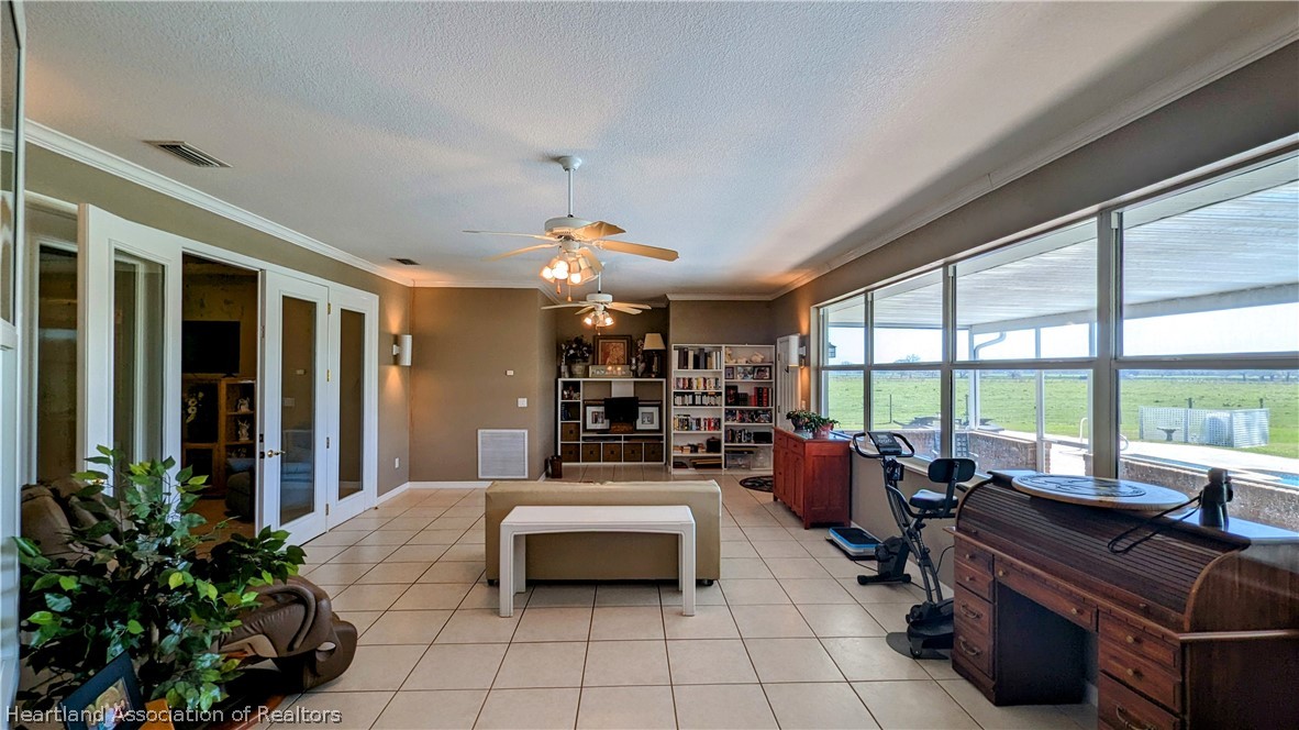 2120 Jack Smith Road Zolfo Springs, FL 33890 - Photo 20 of 36 a living room with furniture and a large window