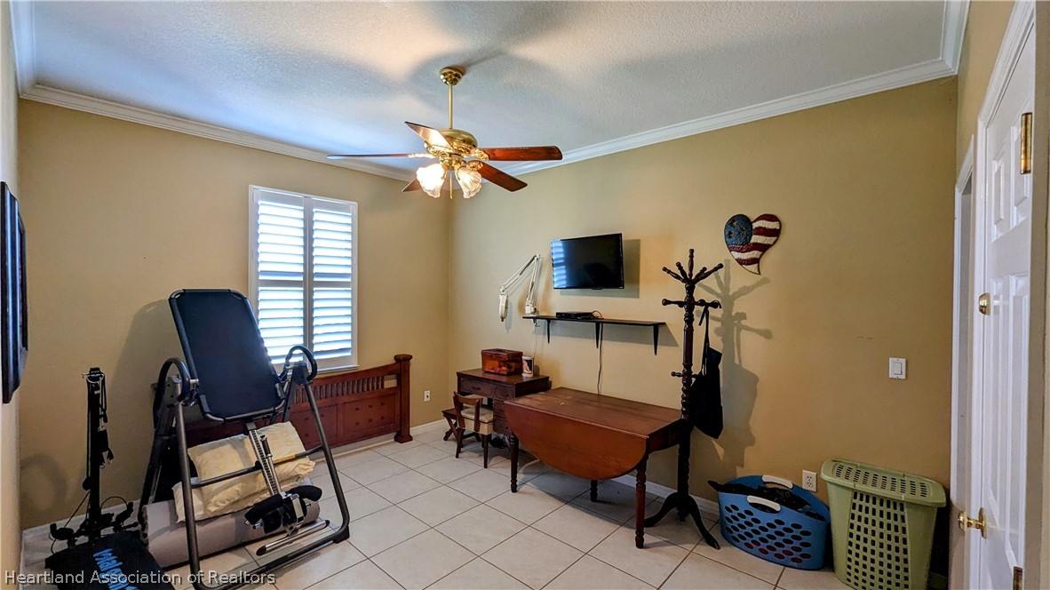 2120 Jack Smith Road Zolfo Springs, FL 33890 - Photo 10 of 36 a view of a workspace with furniture and a window