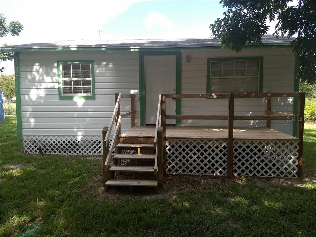 7330 Gano Road Groveland, FL 34736 - Photo 1 of 1 New porch. Skirting is to keep pest from crawl space. This is a Jim Walters built home.