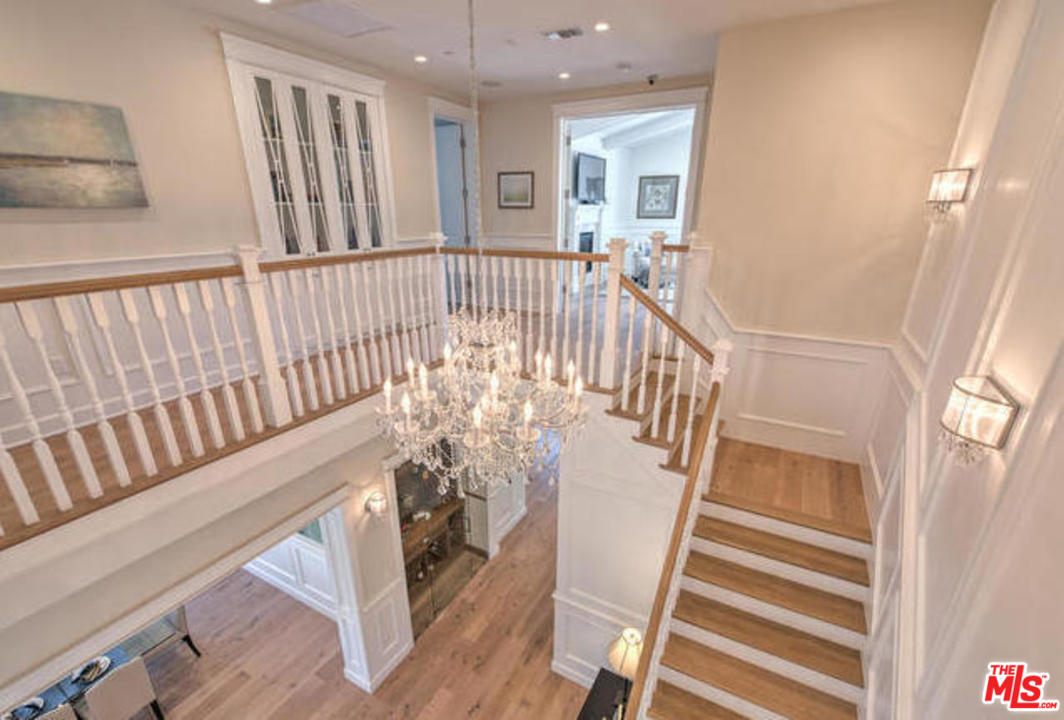 17841 Palora Street Encino, CA 91316 - Photo 13 of 33 a view of entryway with stairs and wooden floor