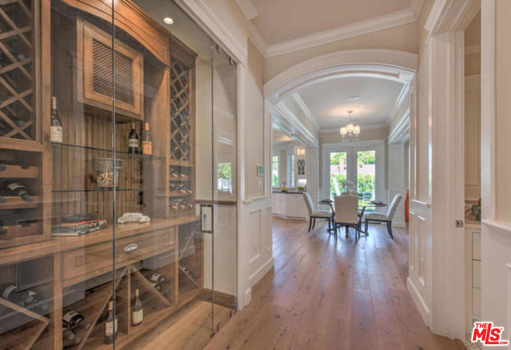 17841 Palora Street Encino, CA 91316 - Photo 6 of 33 a view of a dining room with furniture and wooden floor