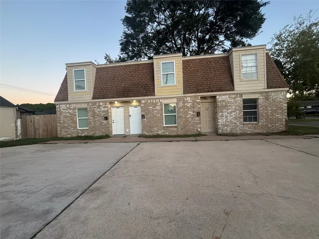 front view of a house with a street
