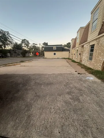 a view of street with car parked