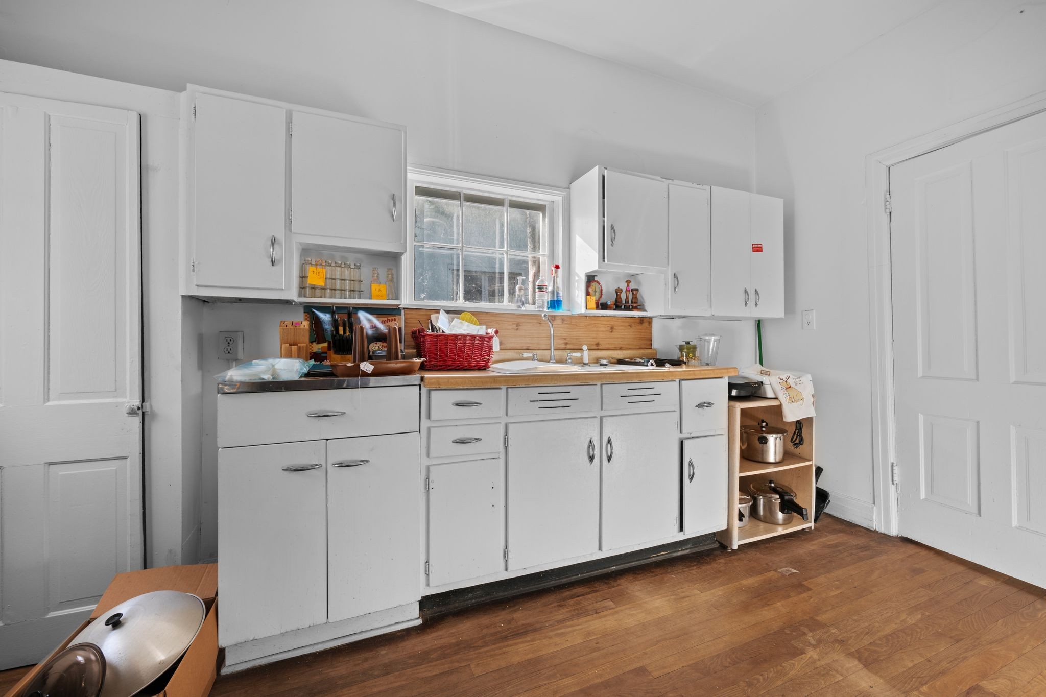 104 Bank Avenue Centerville, TN 37033 - Photo 12 of 18 a kitchen with cabinets and window