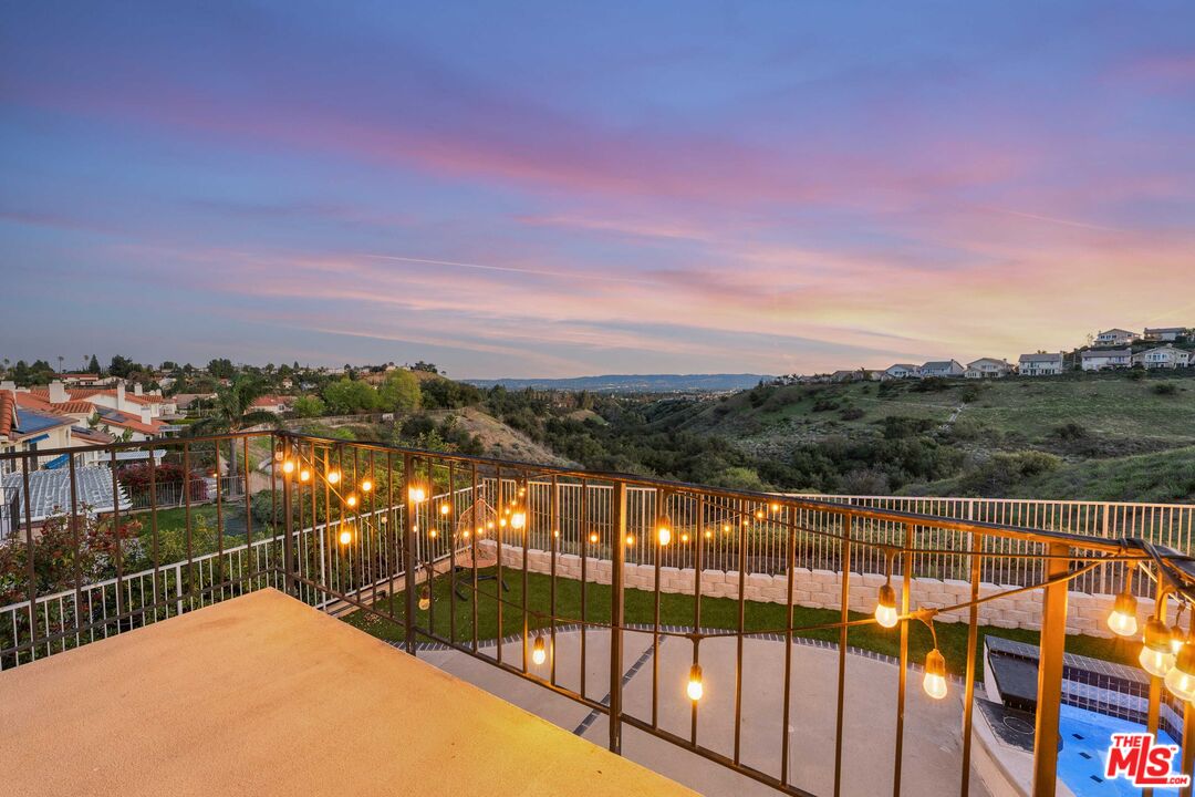 19800 Winged Foot Way Porter Ranch, CA 91326 - Photo 21 of 48 a view of a lake from a balcony