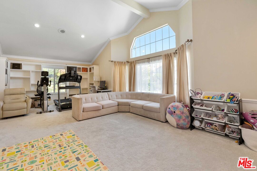 19800 Winged Foot Way Porter Ranch, CA 91326 - Photo 25 of 48 a living room with furniture and a window