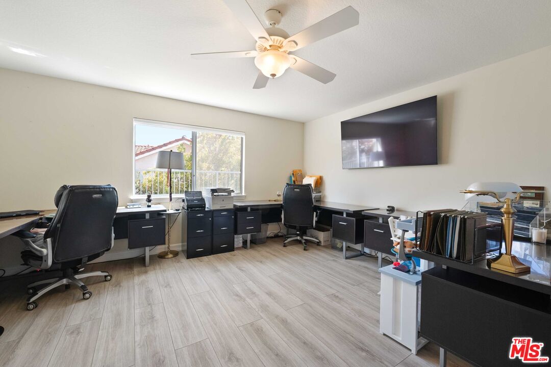 19800 Winged Foot Way Porter Ranch, CA 91326 - Photo 29 of 48 a view of a workspace with furniture and a window