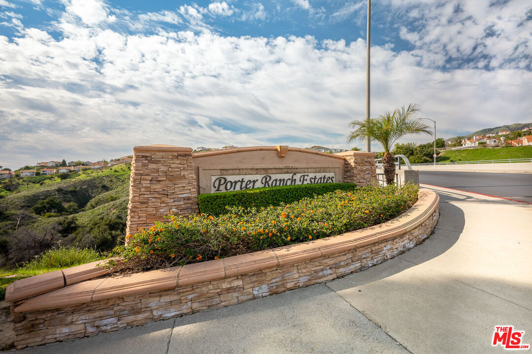 19800 Winged Foot Way Porter Ranch, CA 91326 - Photo 35 of 48 a view of a garden with a building in the background