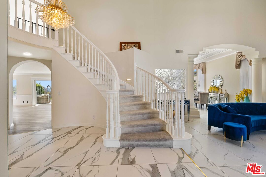 19800 Winged Foot Way Porter Ranch, CA 91326 - Photo 4 of 48 a view of entryway and hall with wooden floor