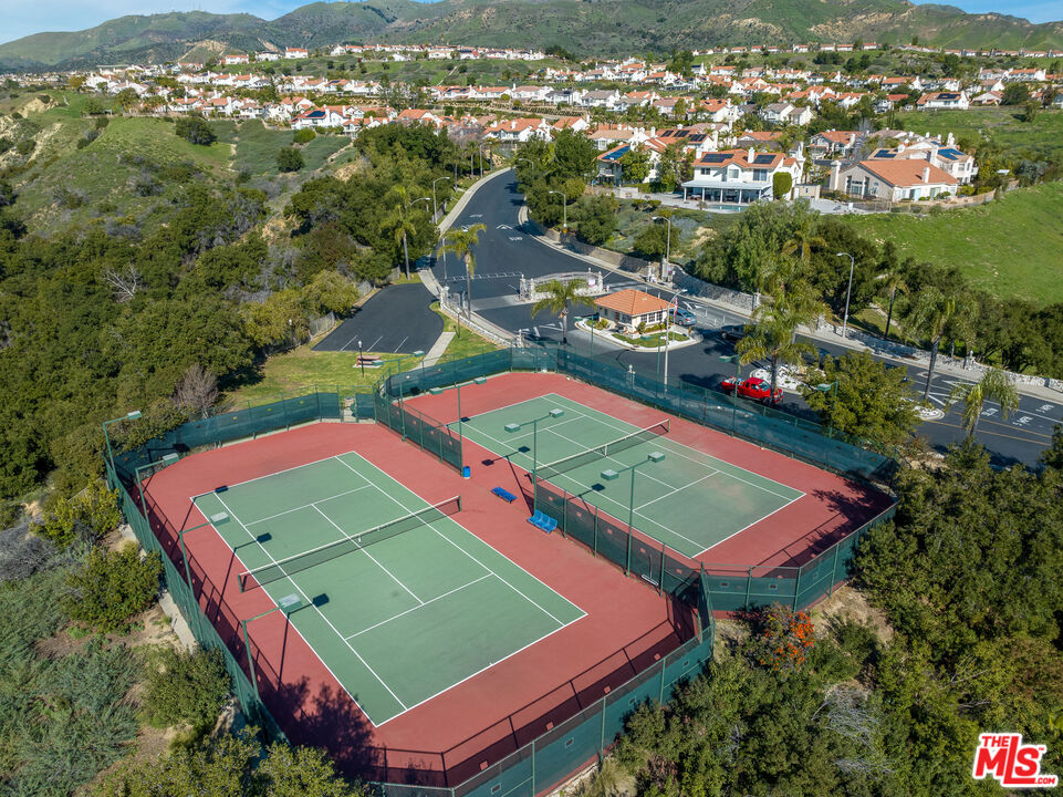19800 Winged Foot Way Porter Ranch, CA 91326 - Photo 42 of 48 an aerial view of a tennis ground and a houses
