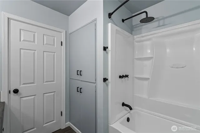 a bathroom with a bathtub