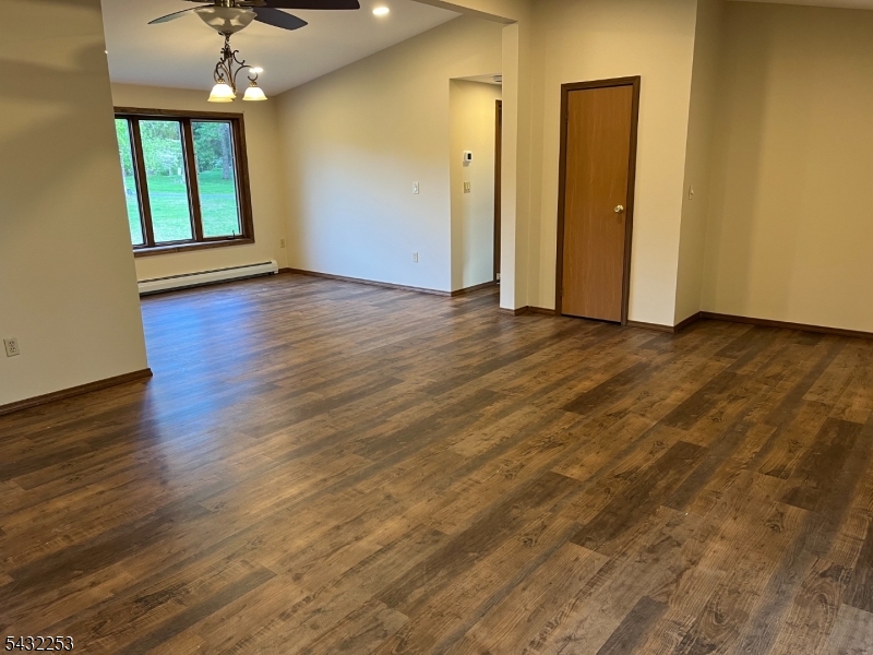 31 Countryside Road Columbia, NJ 07832 - Photo 20 of 31 an empty room with wooden floor and windows