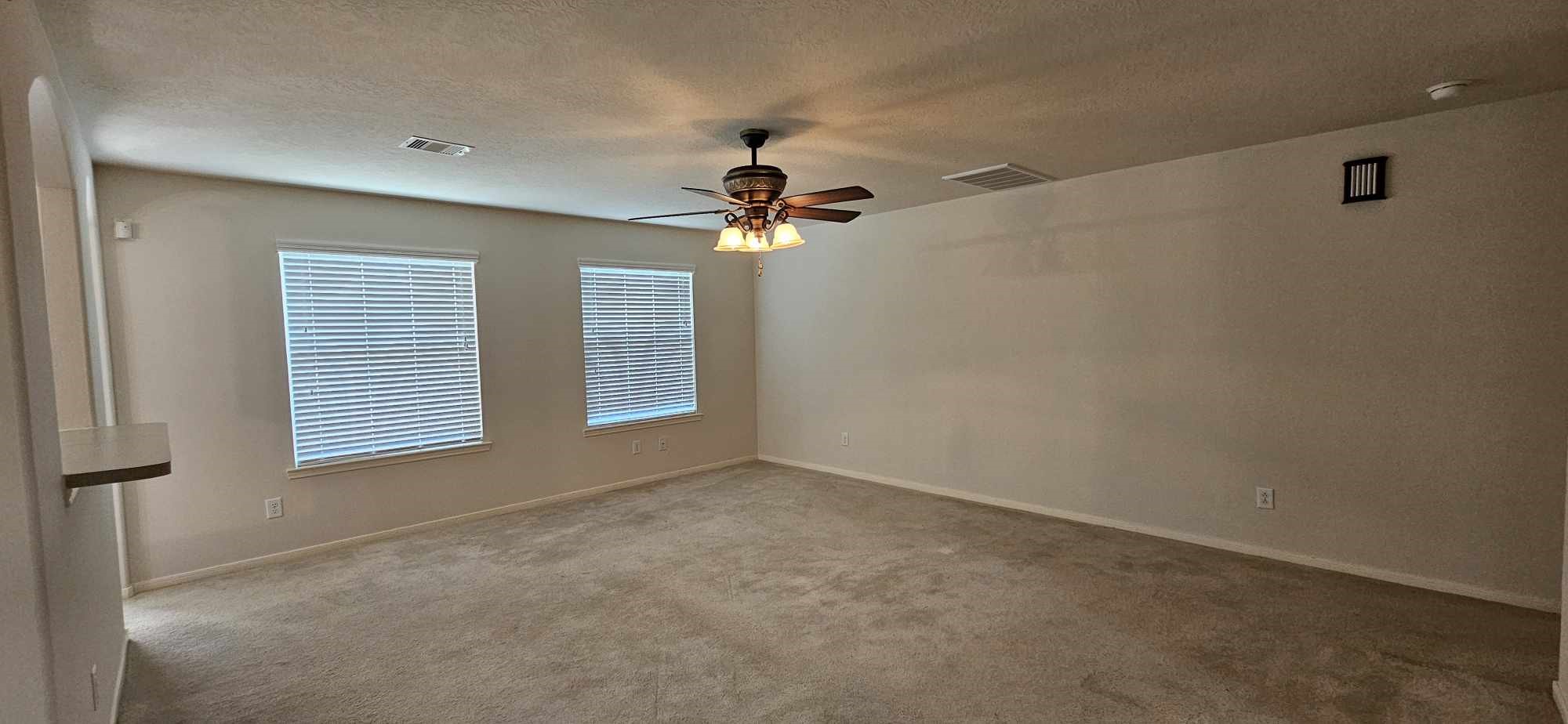 930 Sage Street Baytown, TX 77521 - Photo 13 of 27 a view of an empty room with a window