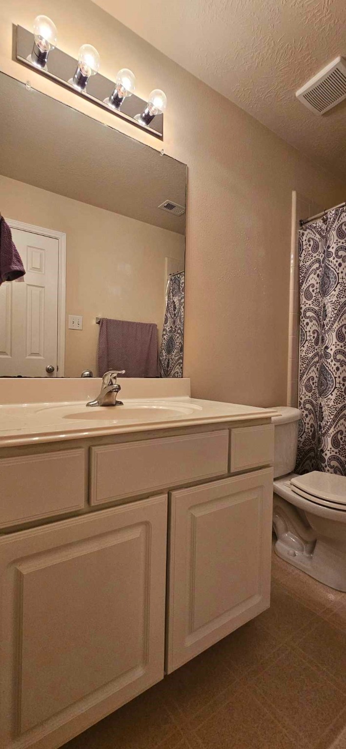 930 Sage Street Baytown, TX 77521 - Photo 22 of 27 a close view of washer and dryer