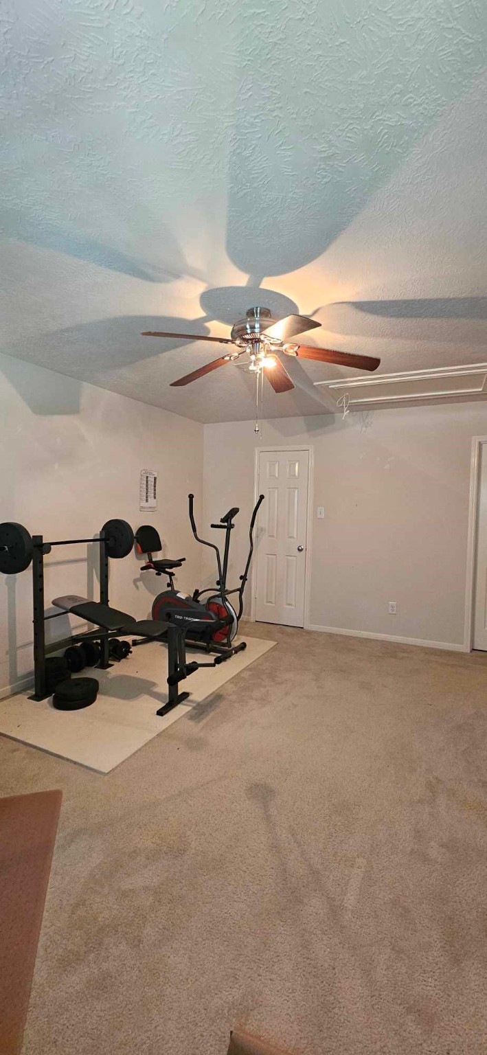 930 Sage Street Baytown, TX 77521 - Photo 24 of 27 a view of a room with rack on the wall