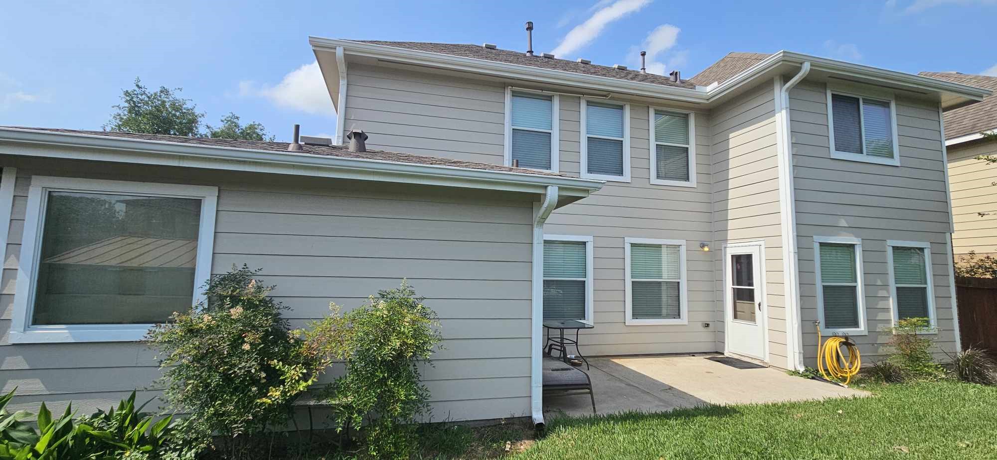 930 Sage Street Baytown, TX 77521 - Photo 25 of 27 a view of a house with a yard