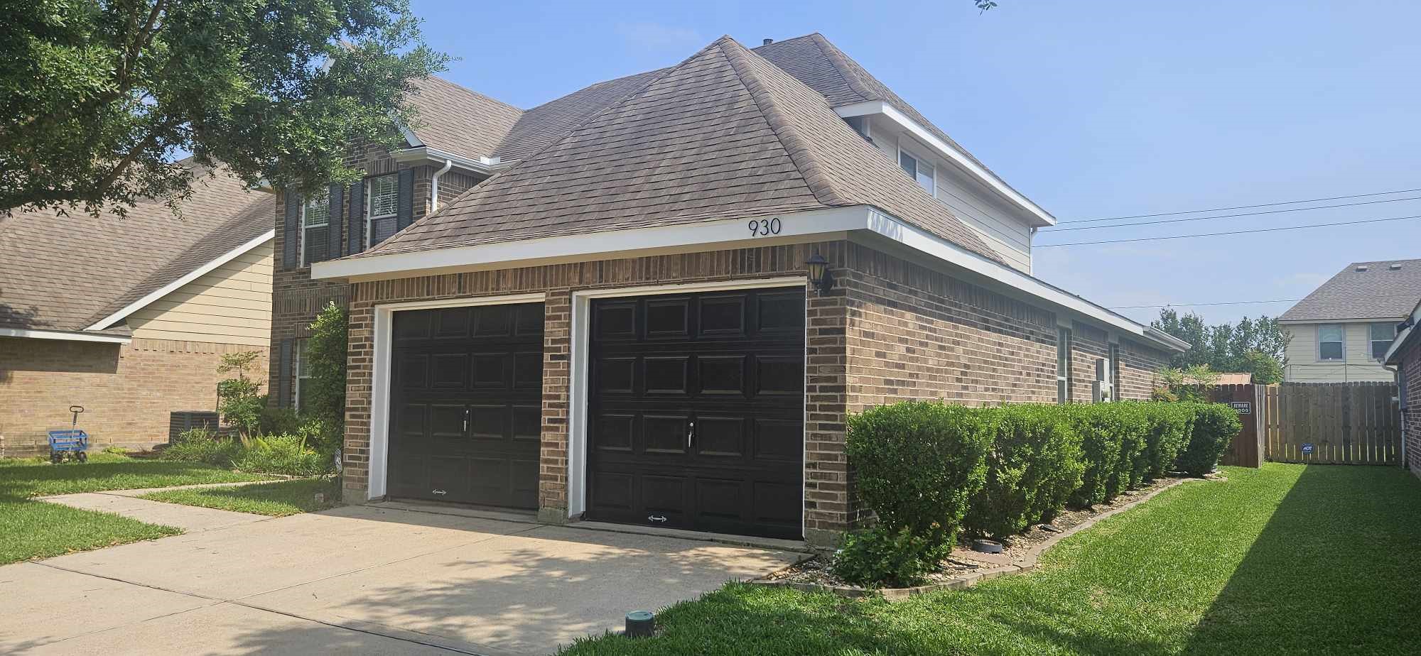 930 Sage Street Baytown, TX 77521 - Photo 5 of 27 a front view of a house with a yard