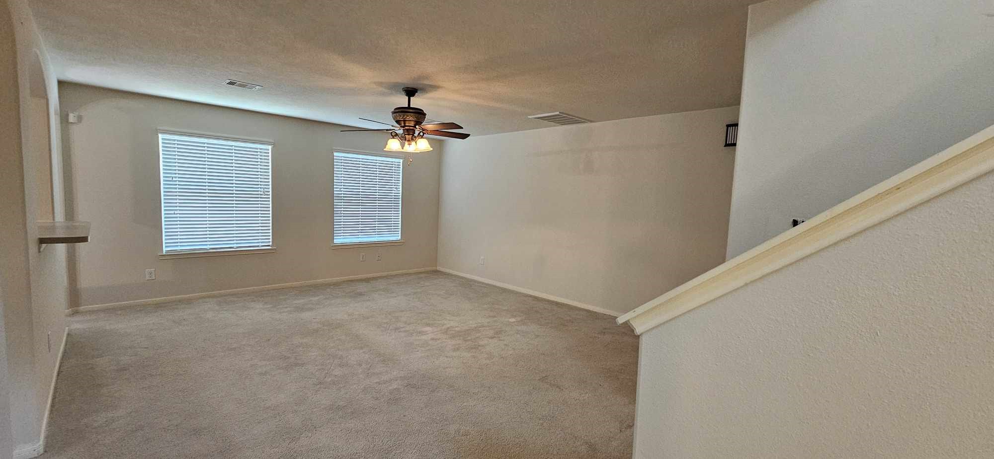 930 Sage Street Baytown, TX 77521 - Photo 10 of 27 a view of an empty room with a window