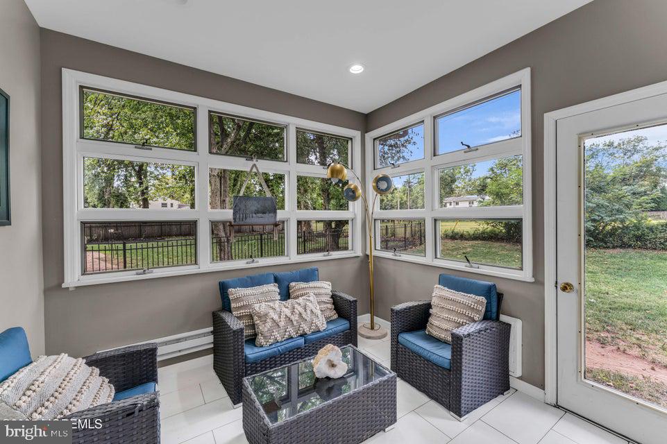 25 Eileen Way Edison, NJ 08837 - Photo 12 of 31 a living room with furniture and a window