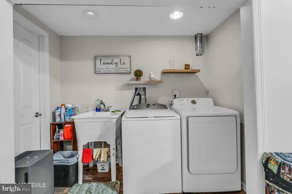 a utility room with dryer and washer