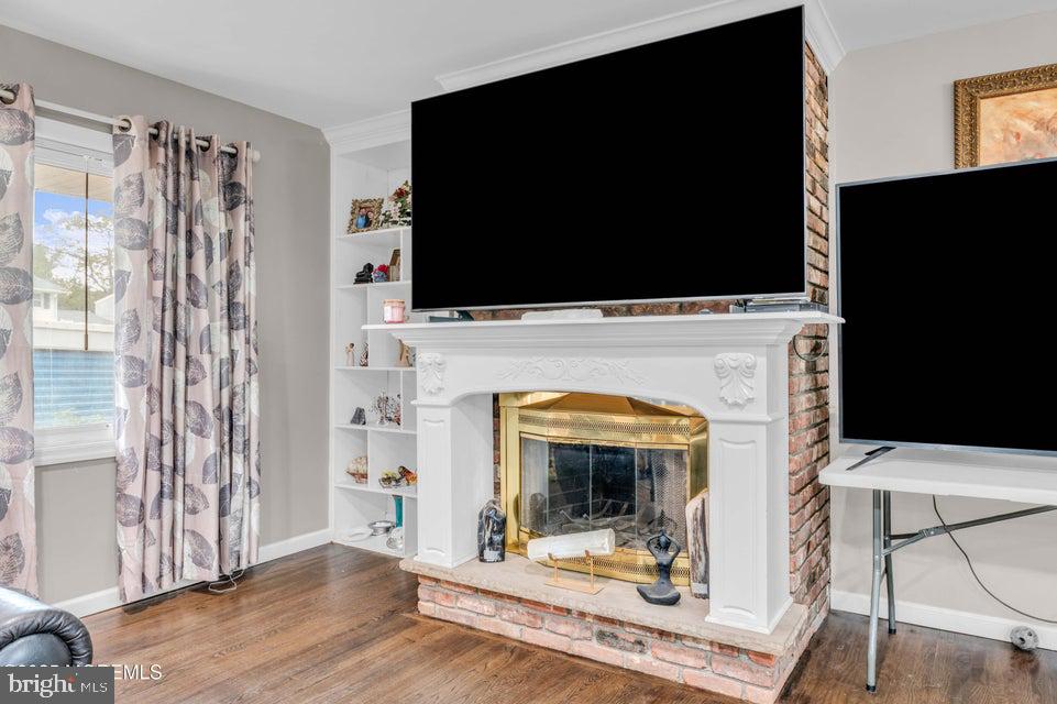 25 Eileen Way Edison, NJ 08837 - Photo 5 of 31 a view of a livingroom with furniture and a fireplace