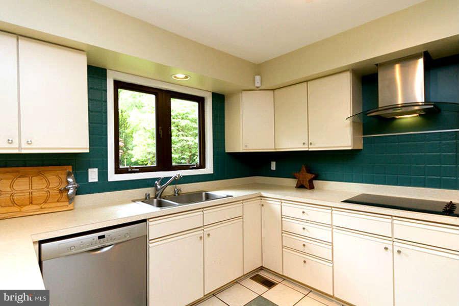 2970 Valley View Road Annapolis, MD 21401 - Photo 13 of 30 Kitchen with Custom Cabinetry and Tile Floor