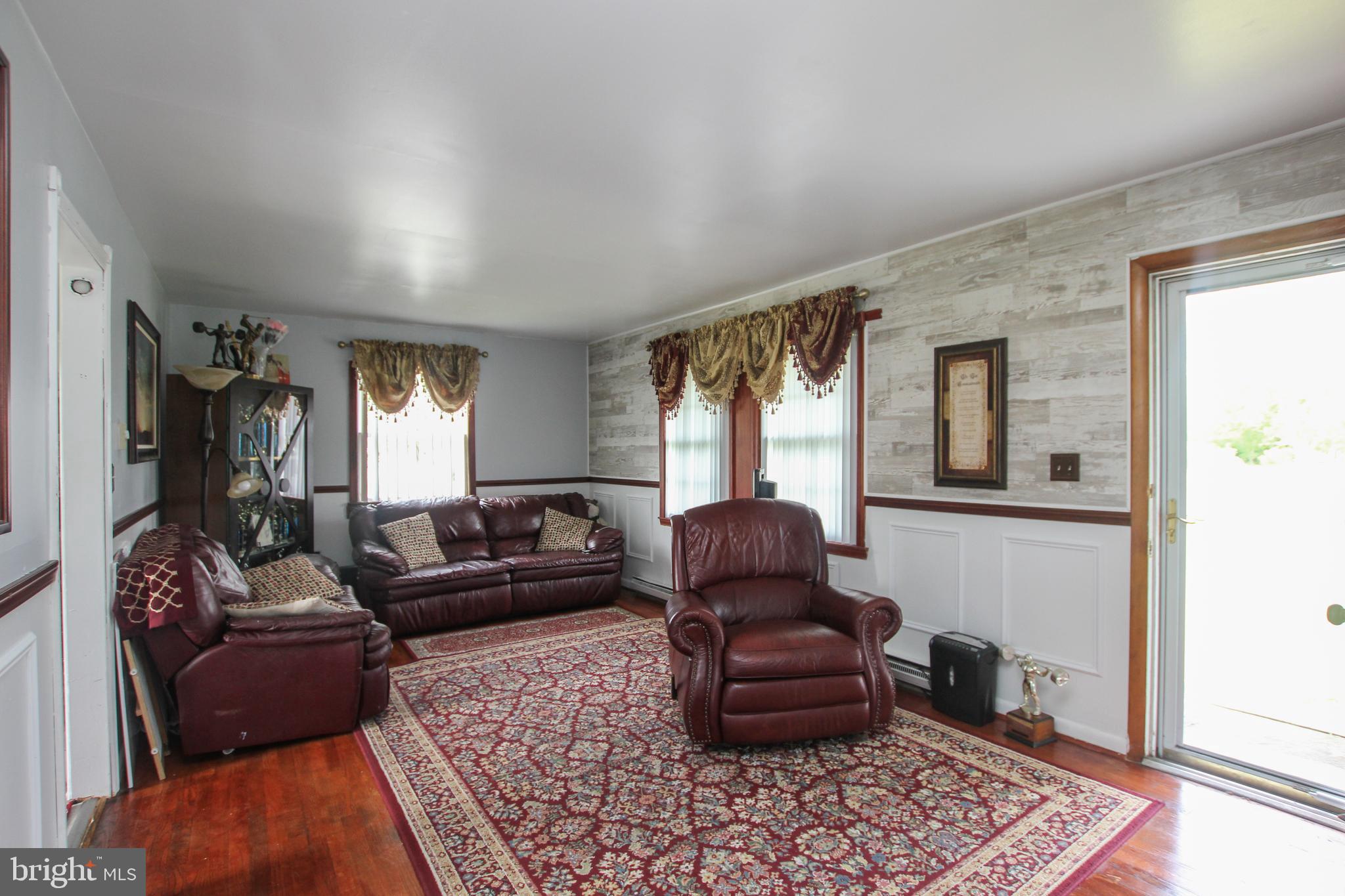 8832 Cannon Road Bridgeville, DE 19933 - Photo 3 of 22 Living Room with Hardwood floors
