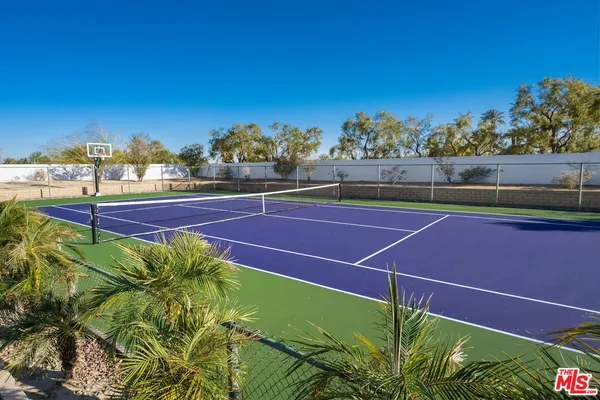 a view of a chairs and table in the terrace