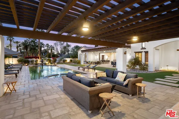 a view of a livingroom with furniture and windows