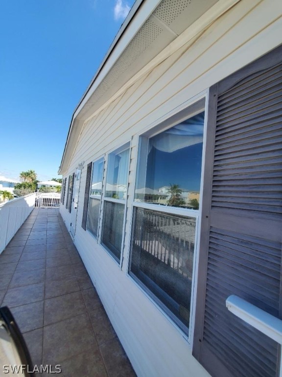 451 Bahia Honda Road Key Largo, FL 33037 - Photo 12 of 31 a view of a balcony with wooden floor