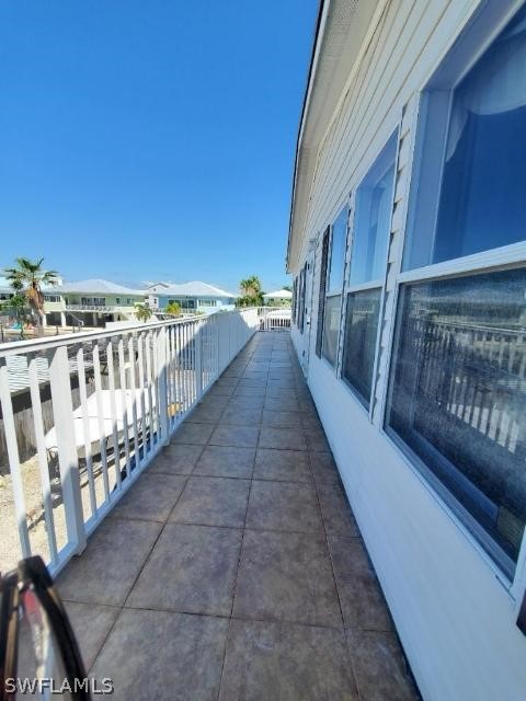 451 Bahia Honda Road Key Largo, FL 33037 - Photo 15 of 31 a view of a balcony with wooden stairs