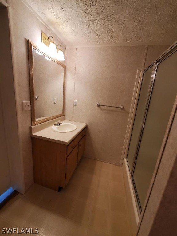 451 Bahia Honda Road Key Largo, FL 33037 - Photo 16 of 31 a bathroom with a sink a mirror and a vanity