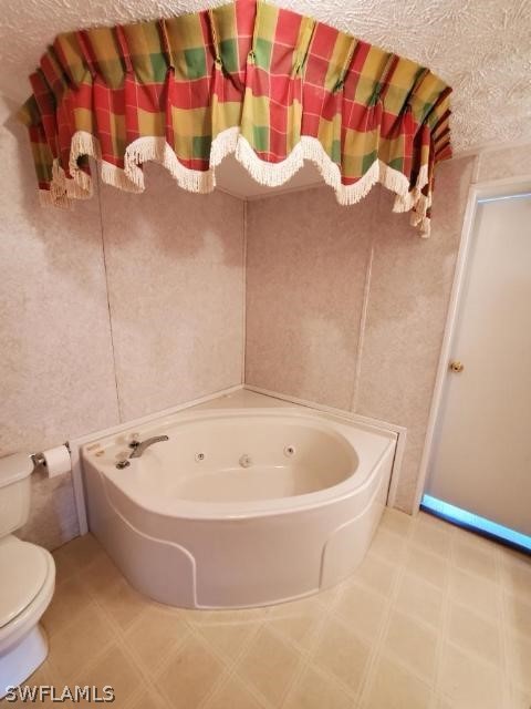 451 Bahia Honda Road Key Largo, FL 33037 - Photo 17 of 31 a white bath tub sitting in a bathroom
