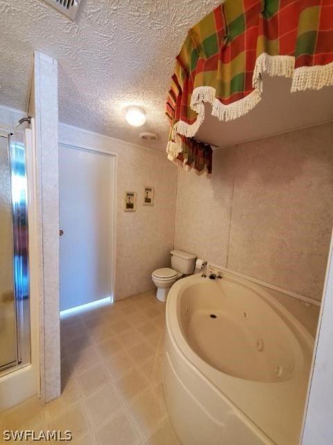 451 Bahia Honda Road Key Largo, FL 33037 - Photo 19 of 31 a bathroom with a bathtub and a shower
