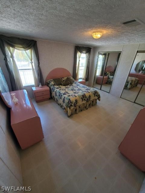 451 Bahia Honda Road Key Largo, FL 33037 - Photo 20 of 31 a bedroom with bed and window