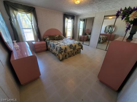 451 Bahia Honda Road Key Largo, FL 33037 - Photo 21 of 31 a bedroom with bed and window