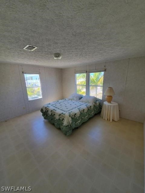 451 Bahia Honda Road Key Largo, FL 33037 - Photo 23 of 31 a bedroom with a bed and window