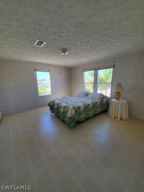 451 Bahia Honda Road Key Largo, FL 33037 - Photo 26 of 31 a bedroom with bed and window
