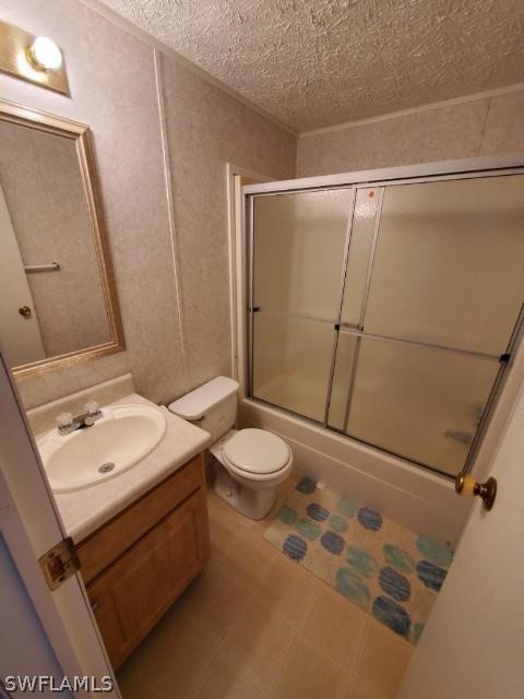 451 Bahia Honda Road Key Largo, FL 33037 - Photo 27 of 31 a bathroom with a sink toilet and shower