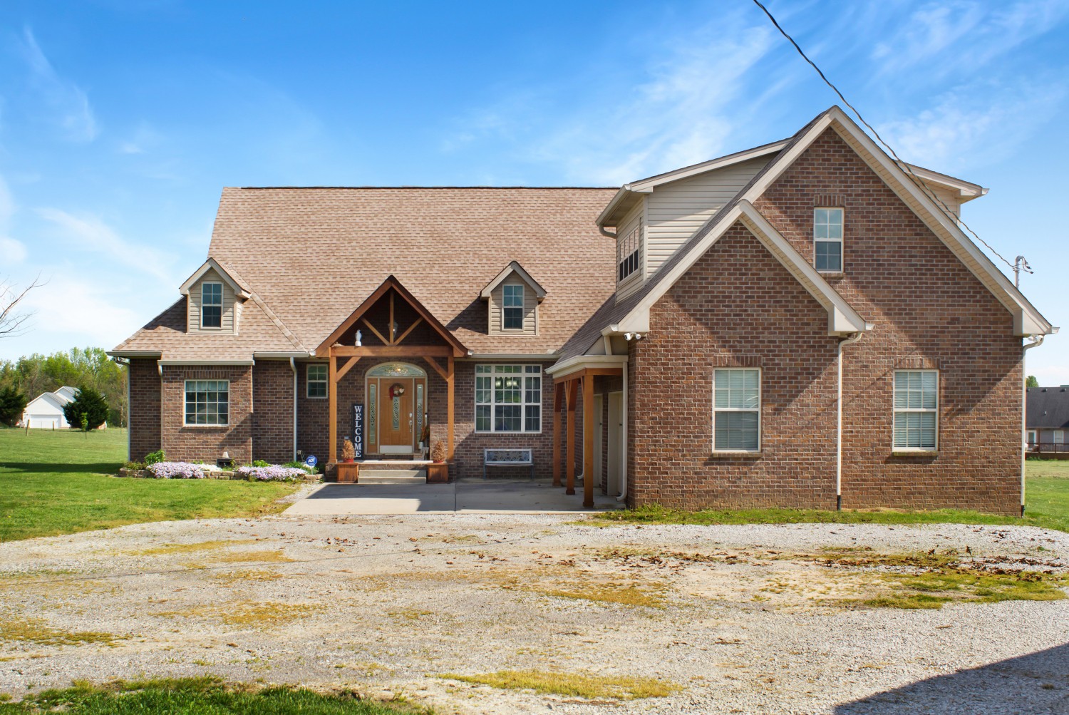 637 Ferrells Loop Road Manchester, TN 37355 - Photo 31 of 43 a front view of a house with a yard