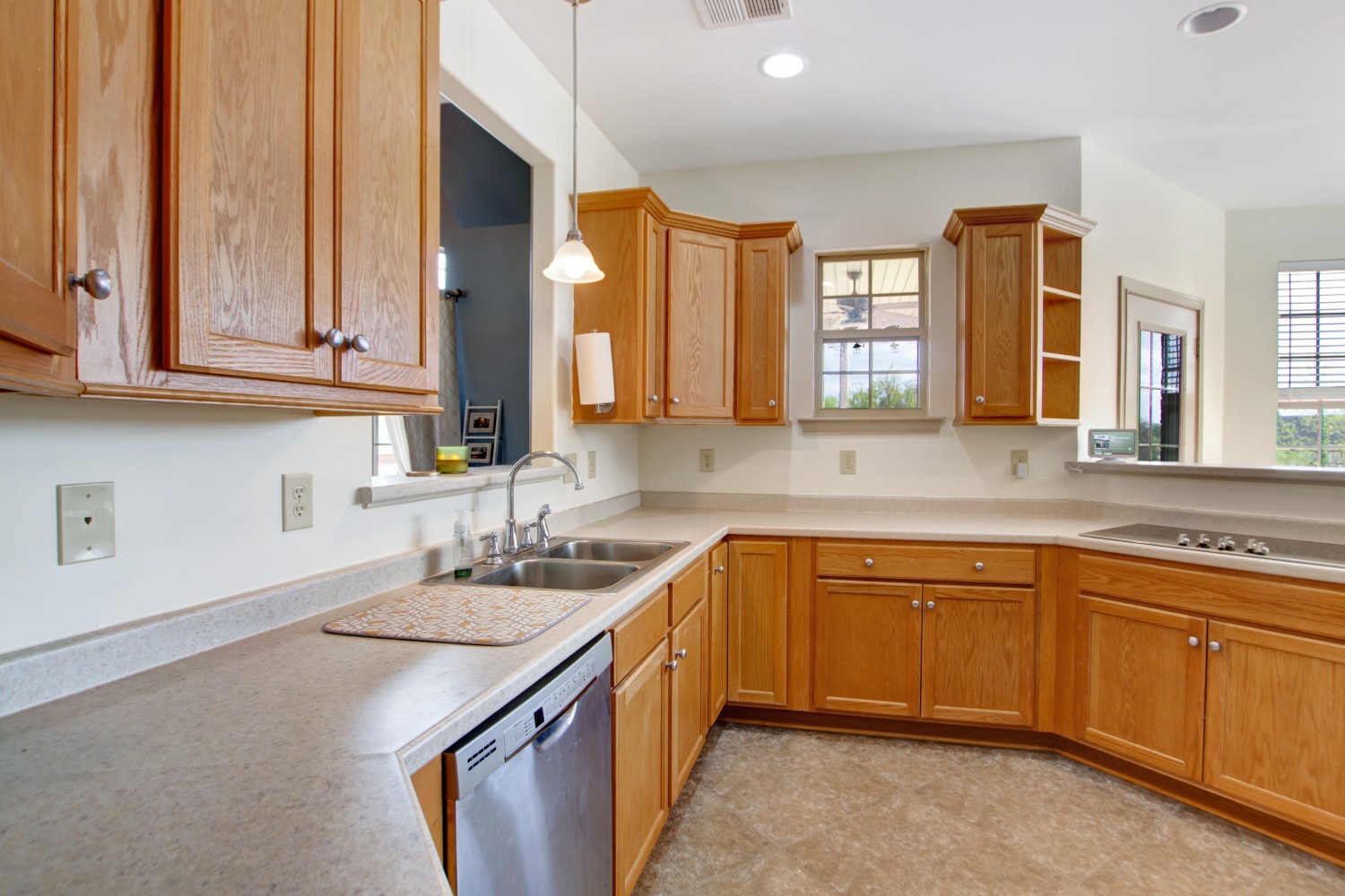 637 Ferrells Loop Road Manchester, TN 37355 - Photo 6 of 43 a kitchen with a sink stove and cabinets