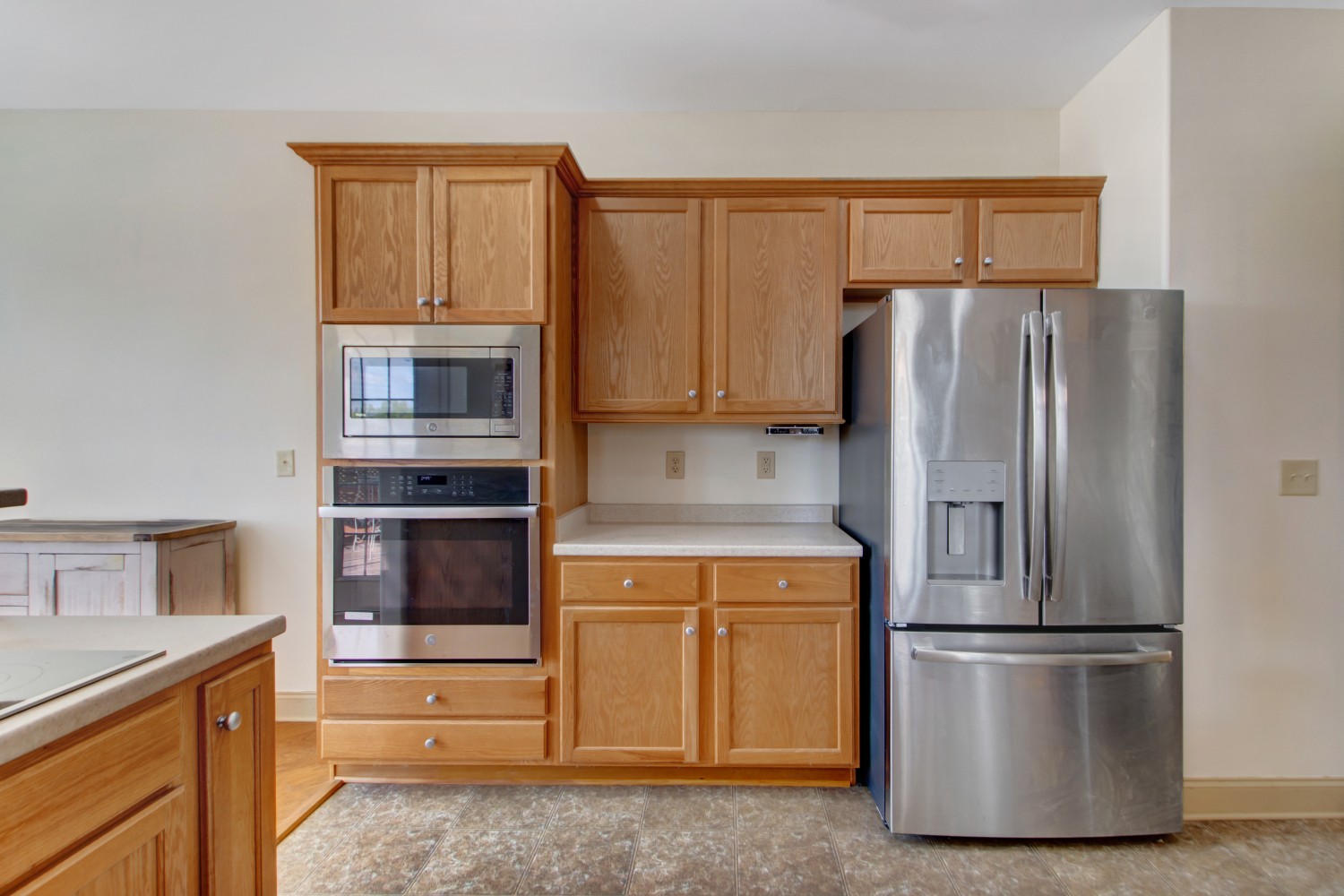 637 Ferrells Loop Road Manchester, TN 37355 - Photo 8 of 43 a kitchen with a refrigerator sink and cabinets