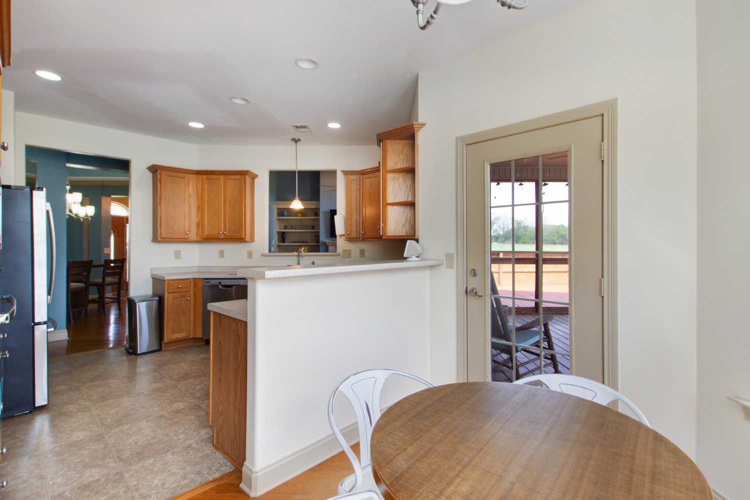 637 Ferrells Loop Road Manchester, TN 37355 - Photo 10 of 43 a kitchen with stainless steel appliances kitchen island granite countertop a refrigerator a sink a stove and oven