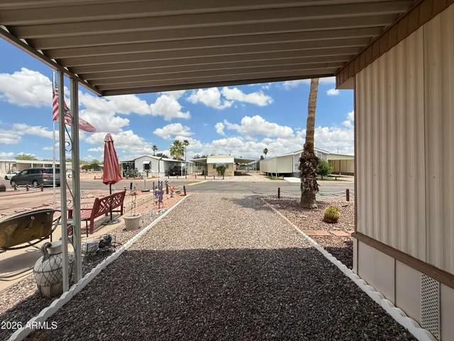 a view of a street with wooden roof