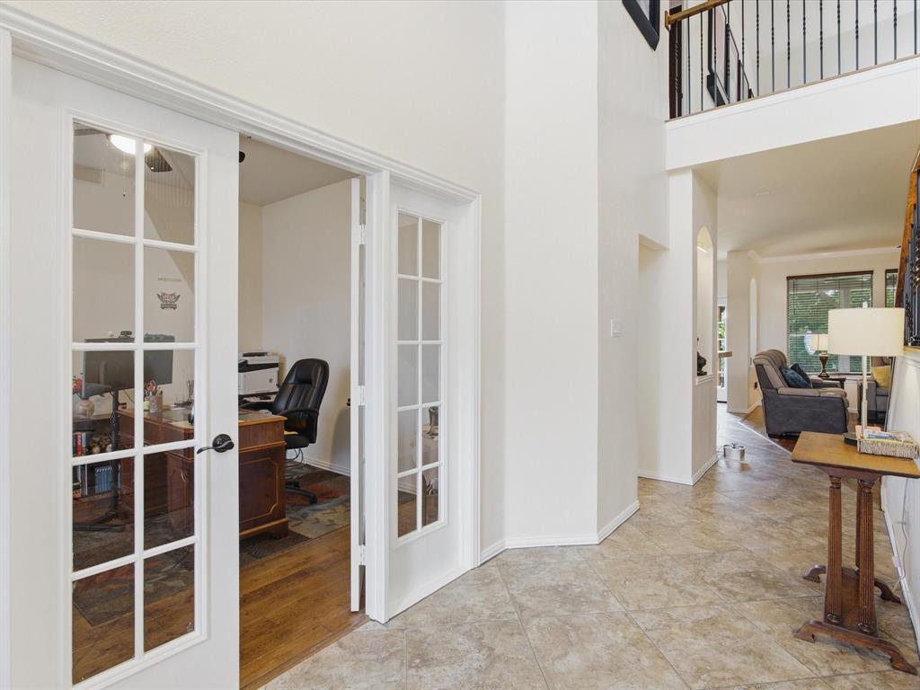 4008 Falcon Ridge Drive Haltom City, TX 76137 - Photo 7 of 40 French doors leading to Office next to Entry