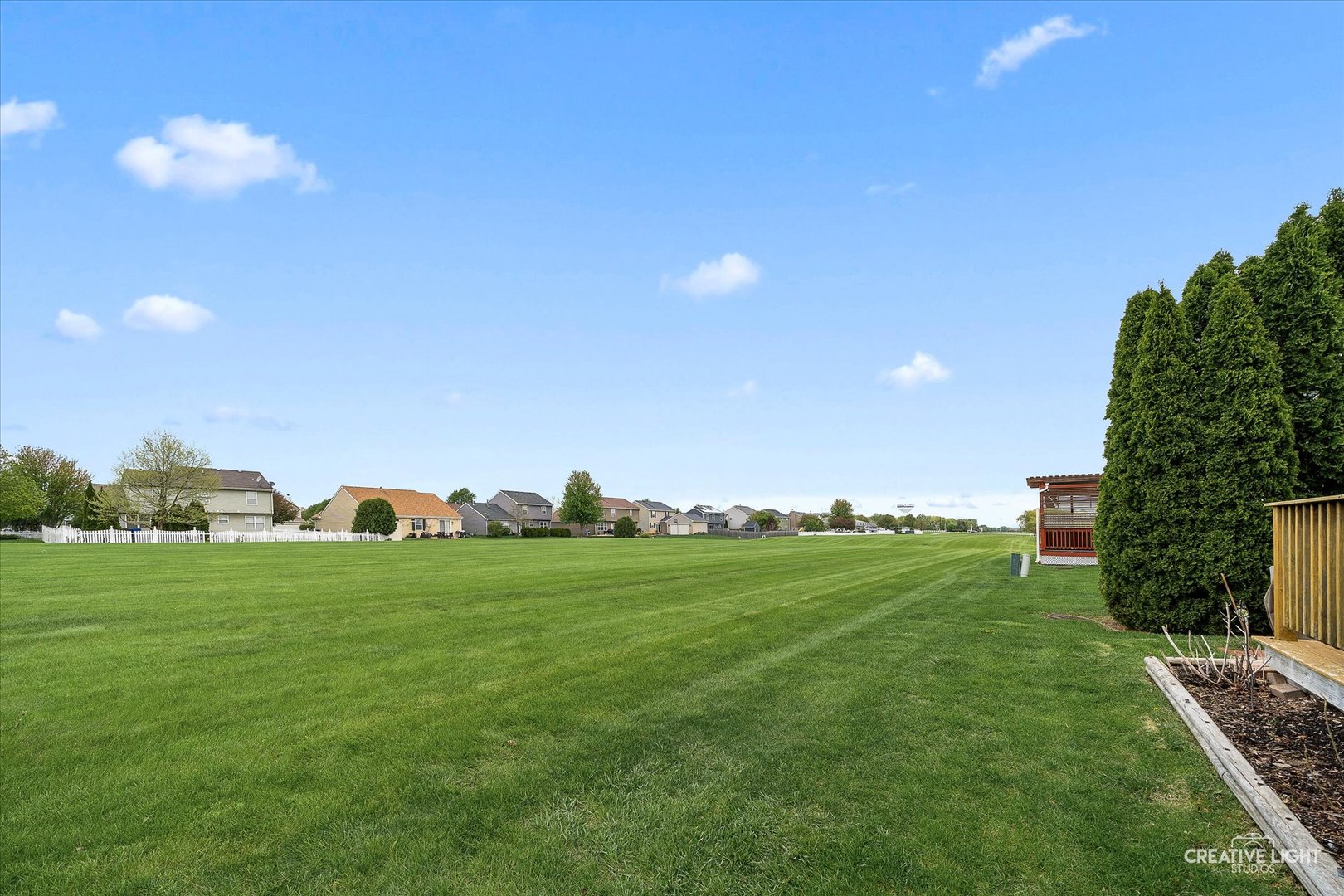 645 Chestnut Ridge Minooka, IL 60447 - Photo 17 of 20 a view of a grassy field