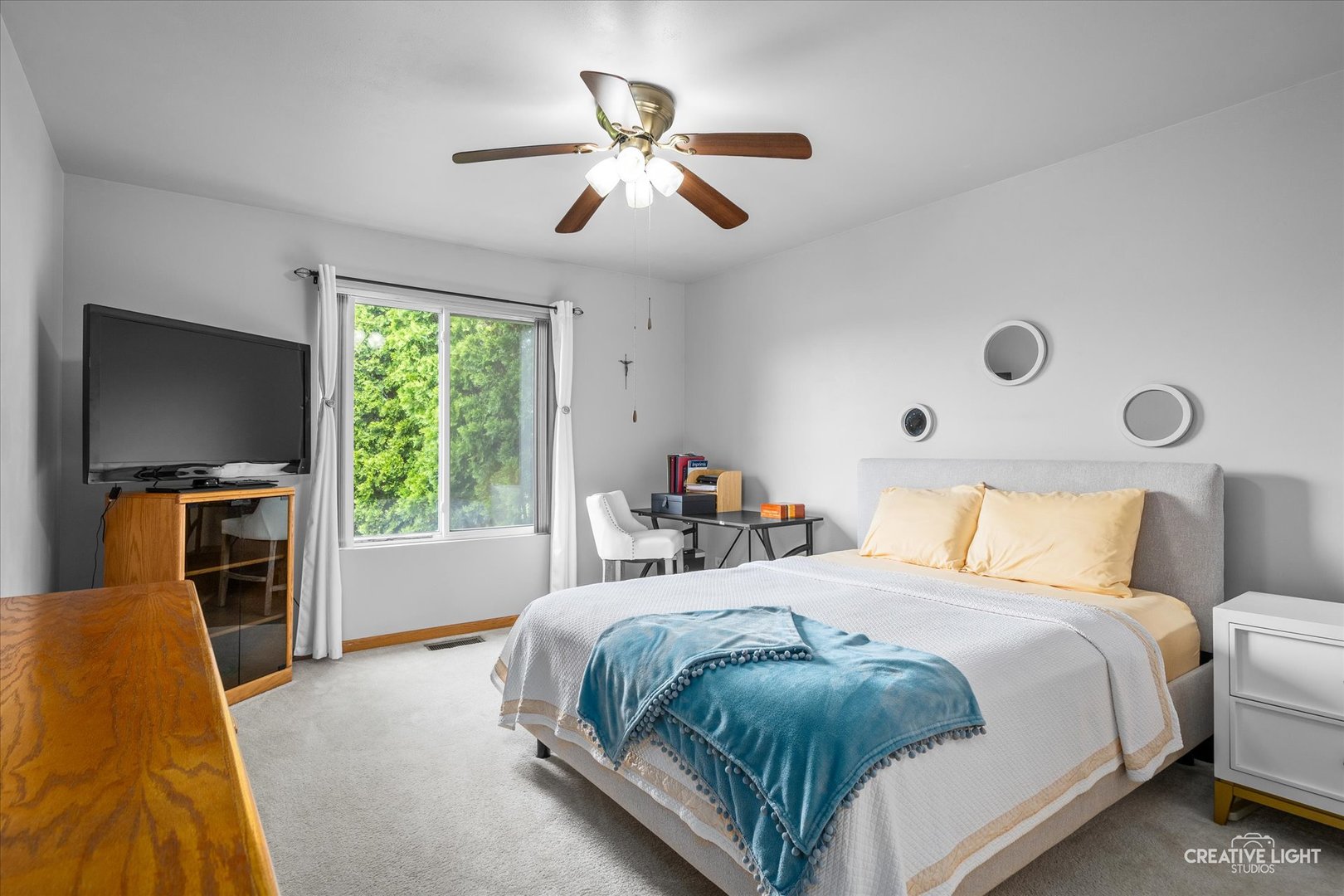 645 Chestnut Ridge Minooka, IL 60447 - Photo 8 of 20 a bedroom with a bed and a flat screen tv