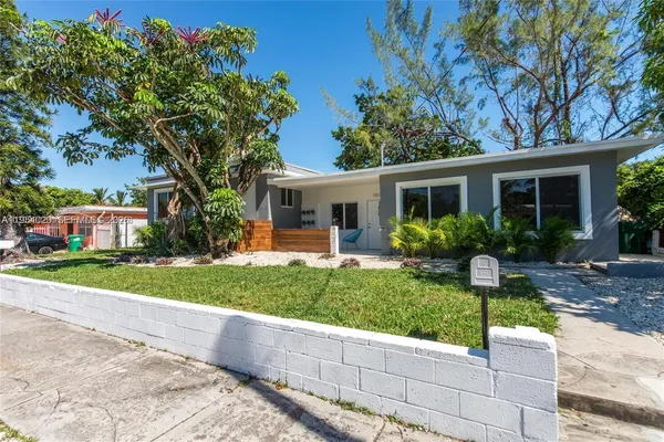 a house view with a garden space