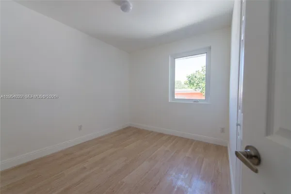 an empty room with a window