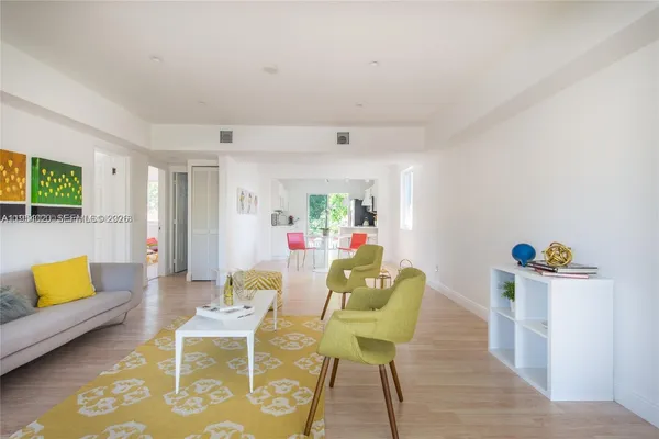 a living room with furniture and a couch
